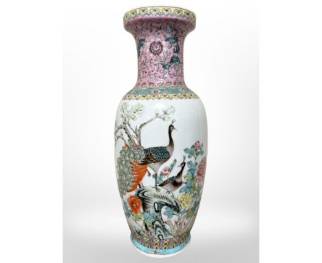 A large Chinese vase decorated with peacocks amongst foliage, height 59.5cm, red character seal mark to base.