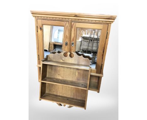 A mirrored pine double-door wall cabinet, height 73cm, and a further oak wall shelf.