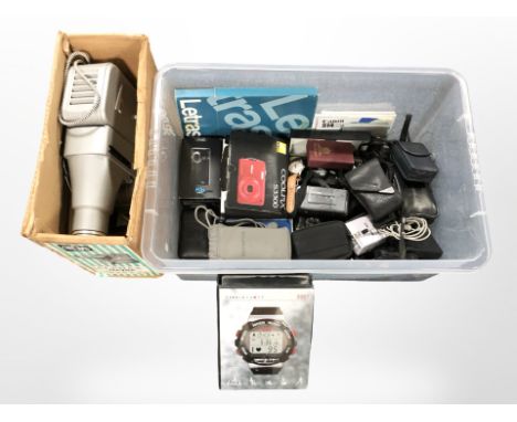 A Gnome projector in box, together with a quantity of digital cameras, related camera equipment. (1 box)