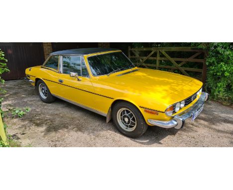 A lovely time-warp Stag from long-term ownership. A late Mk ll in period Mimosa Yellow with a factory hardtop in blackSmart b