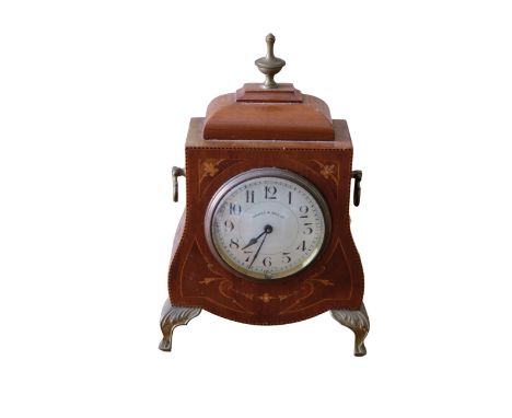 AN EDWARDIAN WALKER &amp; HALL INLAID MAHOGANY BRACKET CLOCK the case on gilt metal feet and urn finial, the white enamel dia