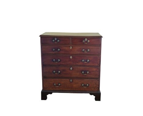 A MAHOGANY TALL CHEST OF DRAWERS, 19th century, the moulded top above two short and four long graduated drawers with brass sw