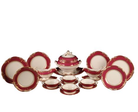 A SPODE PART DINNER SERVICE, the cream ground with a claret border highlighted with gilding. Comprising: tureen, cover and st