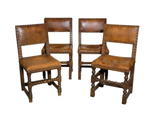 A SET OF CROMWELLIAN STYLE OAK DINING CHAIRS with leather brass close nail upholstered seats and backs, with bobbin-turned fr