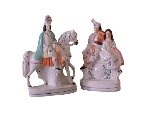 A VICTORIAN STAFFORDSHIRE POTTERY FIGURE OF GARIBALDI painted in overglaze enamels on a gilt-lined base, 38cm high; and anoth