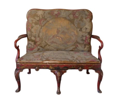 A QUEEN ANNE STYLE RED JAPANNED AND TAPESTRY UPHOLSTERED SETTEE, EARLY 20TH CENTURY, with chinoiserie decoration throughout, 