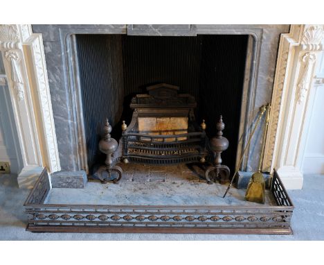 A 17TH CENTURY STYLE FIRE GRATE, with urn finials, on double scroll bracket feet, 95cm wide x 46cm deep x 60cm high