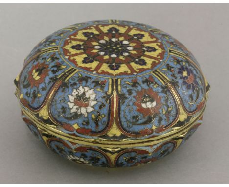 A rare cloisonné Box and Cover,Ming Dynasty or later, heavily cast with lotus leaf panels enclosing varicoloured lotus flower