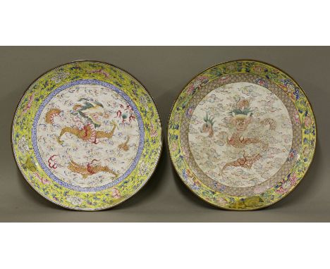 A pair of famille rose Canton enamel circular Saucer Dishes,early Qianlong period, each painted with dragons, one of five cla