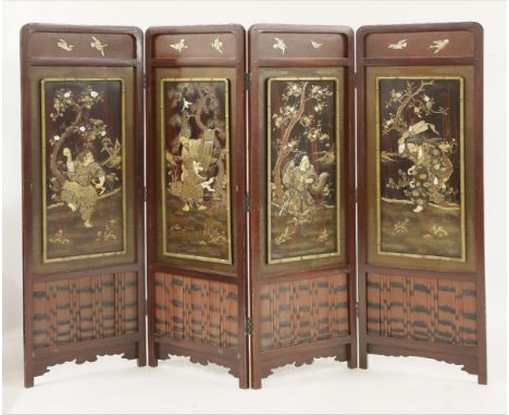 A good four-fold Screen,c.1870, in lacquer and Shibayama, each panel depicting a deity, including Gama Senin and other Daoist