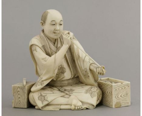An ivory Okimono,c.1880, of a fletcher sighting an arrow, his warming stove by his side, signed Seishu on a lacquer reserve, 