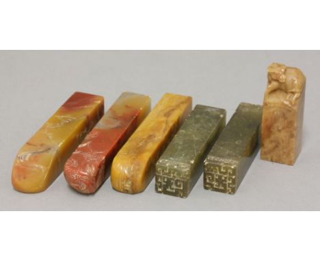 A collection of six Chinese soapstone square seals,19th century, the first of blood-red tone carved with a feng, three of bei