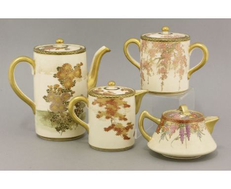 A part coffee service, c.1910, the 'Satsuma' cylindrical body enamelled and gilt with chrysanthemums, prunus and maple compri