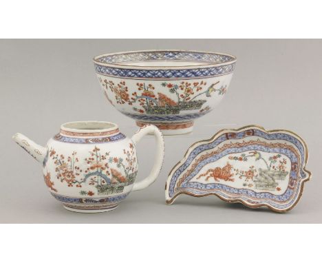 Dutch decorated Kakiemon wares,c.1720, a leaf-shaped spoon tray, a tiger and banded hedge with prunus and bamboo within a cas