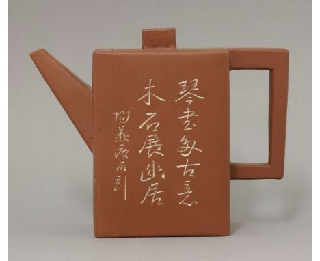 A Yixing teapot and cover, 20th century, the rectangular section tall body incised and white filled with bamboo, the reverse 