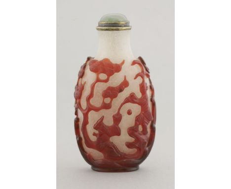 A Peking overlay glass Snuff Bottle, Daoguang (1821-1850), with a scholar receiving water from a double gourd by an immortal 