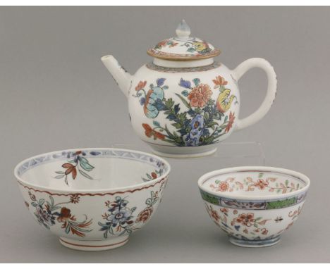 An English decorated Teapot and Cover,c.1740, in bold enamels with finger citron, pomegranate and peony issuing from rockwork