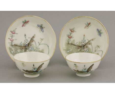 A pair of famille rose small Tea Bowls and Saucers,four character mark in iron-red of Guangxu (1875-1908), each piece painted