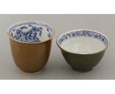 A tall Beaker, Kangxi (1662-1722), the exterior with a coppery glaze, the interior underglaze blue with rhinoceros horns amon