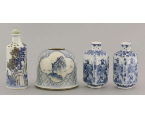 Three blue and white snuff bottles, 20th century, one cylindrical with buildings, rocks and trees, and with copper-red detail