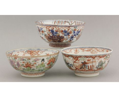 Three Dutch decorated Bowls,1720-1740, the first with underglaze blue floral sprays overpainted in red, green and gilt enamel