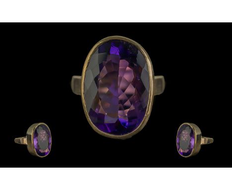 Antique Period - Quality 9ct Gold Single Stone Amethyst Set Ring. Full Hallmark to Interior of Shank. The Large Oval Shaped F