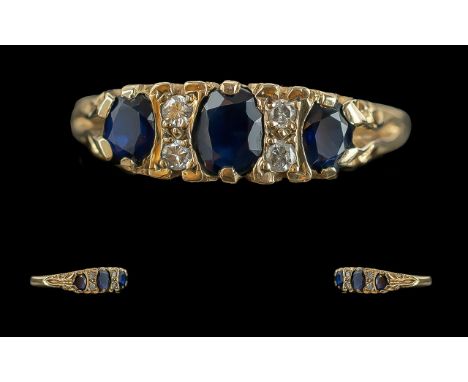 Ladies Pleasing 9ct Gold Sapphire &amp; Diamond Set Ring.  Ornate raised setting, full hallmark to shank.  Ring size S.  Weig