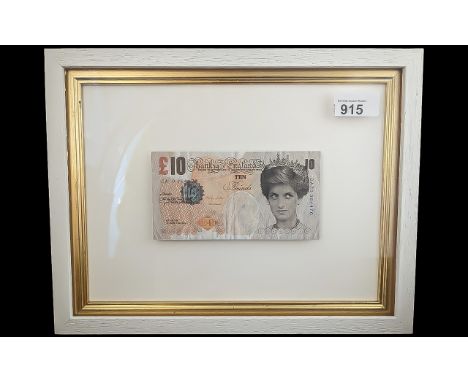 Banksy Interest - Di-Faced Tenner, mounted and framed. Back of frame with clear aperture to view back of note. Banksy British
