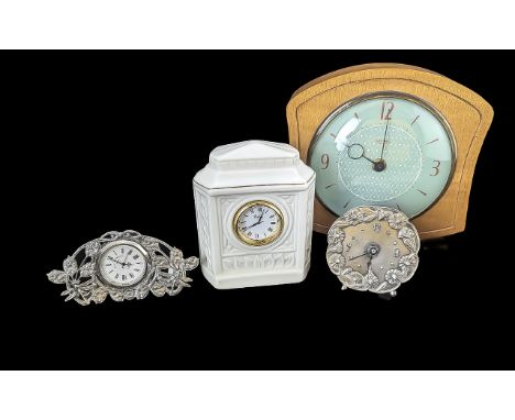 Collection of Four Clocks, including a Belleek Florentine white porcelain clock, Smiths vintage teak mantle clock, and two wh