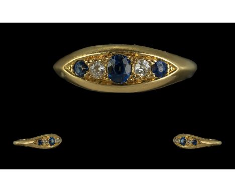 Antique Period 18ct Gold - Blue Sapphire and Diamond Set Ring. Full Hallmark for London 1912 To Interior of Shank. The Sapphi