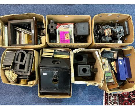 Seven Boxes Containing  Camera Related Accessories including Evans projector, glass slides, books, cameras, Reel to Reel proj