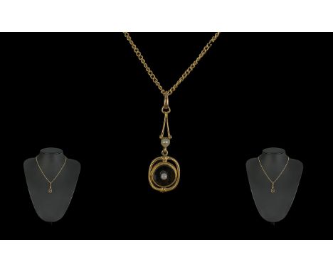 Ladies 9ct Gold Pleasing Black Enamel and Pearl Set Pendant - Attached to 9ct Gold Chain. Both Marked for 9ct. Length 17 Inch