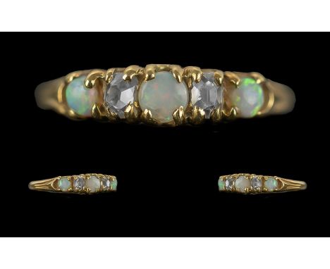 Antique Period - Attractive 18ct Gold Diamond and Opal Set Ring. Tests High Ct Gold. The Opals of Milky Colour with Old Cut D