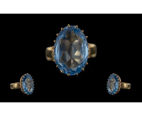 Ladies - Attractive 9ct Gold Single Stone Aquamarine Set Statement Ring. Full Hallmark to Shank. The Large Faceted Aquamarine