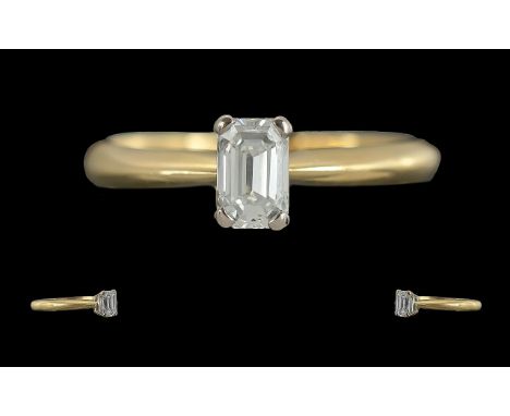 Ladies 18ct Gold Single Stone Diamond Set Ring. Marked 18ct to Interior of Shank. The Emerald Step-cut Diamond of Excellent C