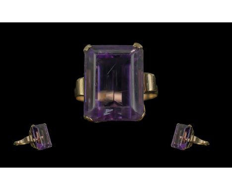 Ladies Pleasing 9ct Gold Single Stone Amethyst Set Ring marked 9ct to interior of shank the large step cut amethyst of good c