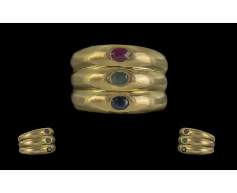 18ct Gold Trilogy Banded Gem Set Ring. Set with Blue Sapphire Emerald and Ruby all of Good Colour. Marked 750 to Shank. Ring 