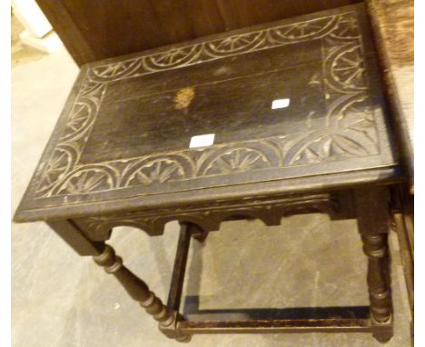 Dark hardwood side table with ornate carved top and sides, L: 65 cm