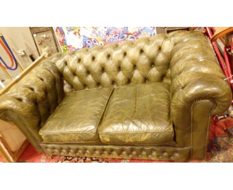 Dark green button backed two seater Chesterfield settee