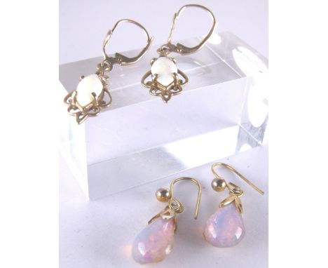 Two pairs of presumed gold and opal earrings 