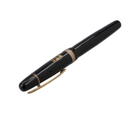 UHU VINTAGE Füller "DER UHU KUGELTINTER", Koll.: 50er Jahre. Kolbenfüller mit Rollerball, schwarzes Modell mit goldfarbenen D