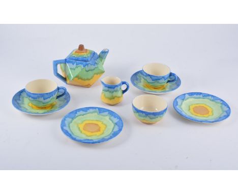 A Hancock's Ivory ware tea-for-two, circa 1930, with geometric shaped teapot, in blue, green, green, brown and green banding,