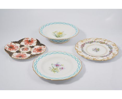 Four decorative plates, to include a Copeland plate decorated with thistles, a silvered comport decorated with daffodils, c19