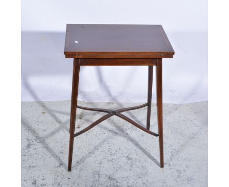 Edwardian inlaid mahogany card table with satinwood banding, fold-over top with baize interior, tapering and splayed legs, wi