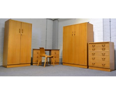 G-plan light oak bedroom suite, double wardrobe, width 122cm; another wardrobe, width 92cm; chest of drawers; dressing table.