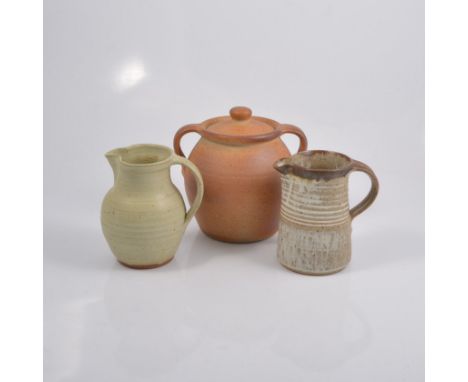 John Leach/ Muchelney Pottery, a stoneware twin-handled covered pot, 17.5cm high; another Muchelney Pottery jug; and a Winchc