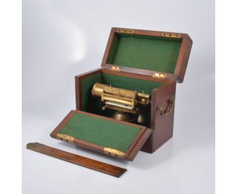 A Theodolite in a mahogany case, E R Watts & Son, B709, No 21301, together with two electrical resistance instruments, and sc