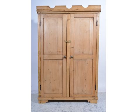 Pine two-door wardrobe, bracket feet, width 103cm, depth 49cm, height 161cm.