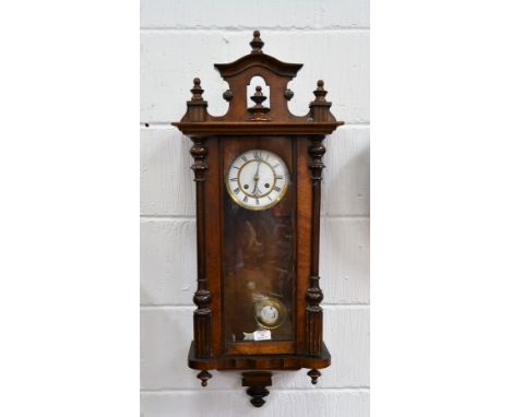 A mahogany cased Vienna style wall clock, 13cm white dial with roman numeral chapter ring, twin train striking movement, the 