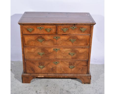 George II walnut, oak and pine chest of drawers, fitted with two short and three long drawers, bracket feet, width 96cm.
